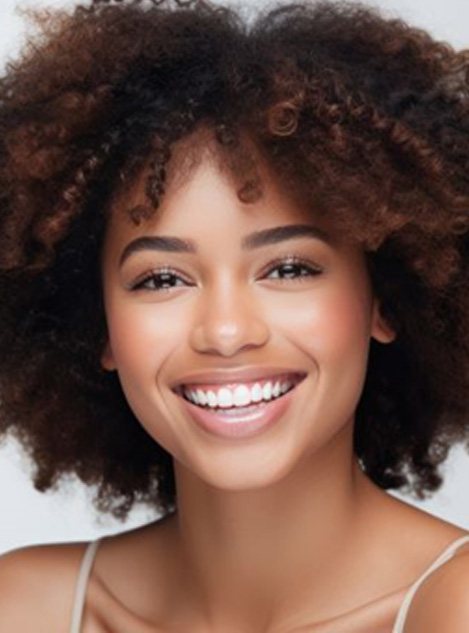 Smiling woman with straight, beautiful teeth