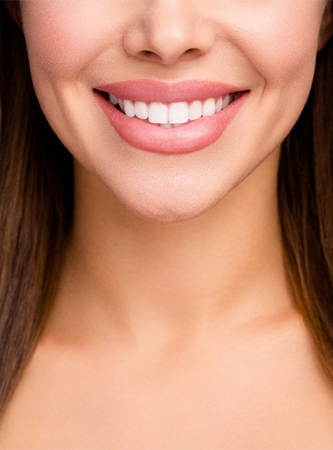 Close up of a long haired woman smiling