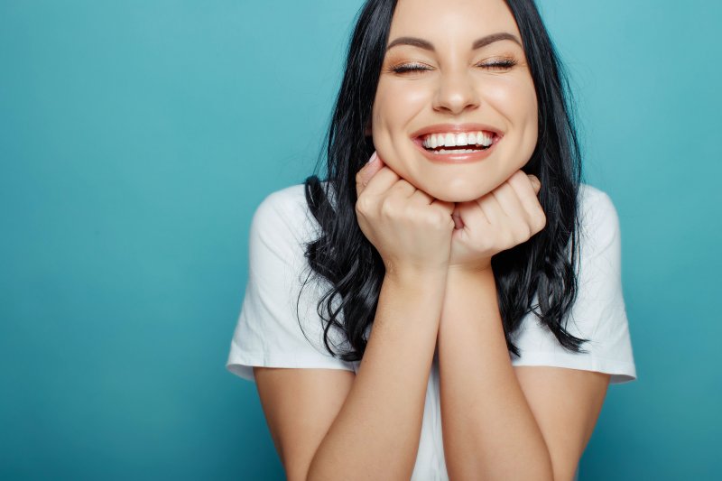 woman enjoying her dental implant success in Atlanta