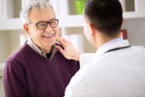 a patient attending their dental implant consultation 