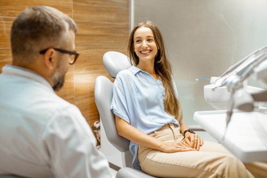 Patient smiles at dentist